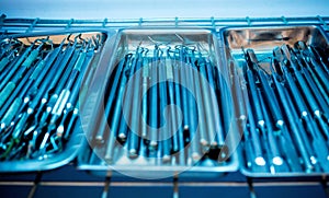 Dental instruments kit in the trays background