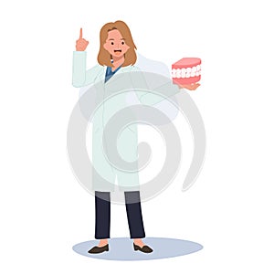 Dental medical concept. Female Dentist with mouth model is presenting or explaining suggestion how to take care  teeth. Flat