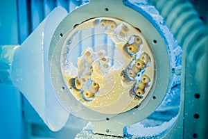 Dental milling machine carving out shape of human teeth