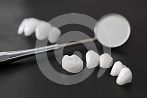 Dental mirror and zircon dentures - Ceramic veneers - lumineers
