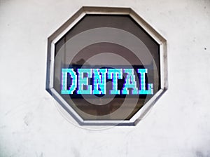 Dental Neon Sign in an Octagon Shaped Window