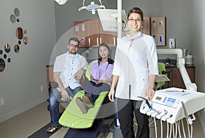 A dental office with employee and client