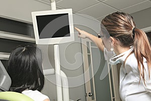 A dental office with employee and client