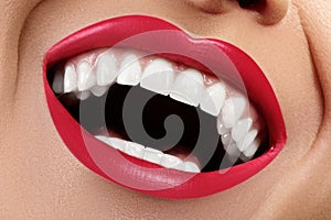 Dental photo. Macro Happy Female Smile with Healthy White Teeth. Red Lips Make-up. Stomatology Treatment, Whitening