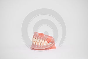 Dental prostheses on a white background. Beautiful teeth ceramic press ceramic crowns and veneers