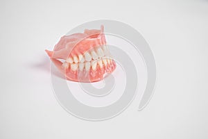 Dental prostheses on a white background. Beautiful teeth ceramic press ceramic crowns and veneers