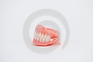 Dental prostheses on a white background. Beautiful teeth ceramic press ceramic crowns and veneers
