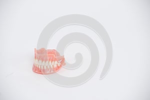 Dental prostheses on a white background. Beautiful teeth ceramic press ceramic crowns and veneers