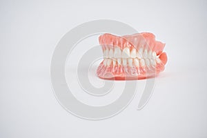 Dental prostheses on a white background. Beautiful teeth ceramic press ceramic crowns and veneers