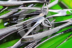 Dental surgical forceps after disinfection. Metal tools in a dental clinic