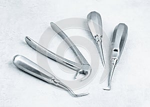 Dental surgical instruments on white background
