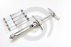 Dental Syringe with Local Anesthetic Cartridges photo