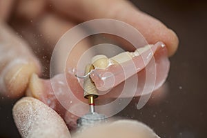 Dental technician make dental prothesis in dental laboratory