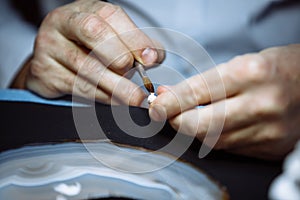Dental technician makes dentures.