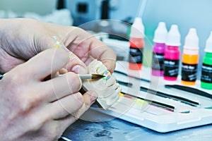 Dental technician work. prosthesis production. teeth prototype construction