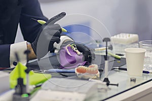 Dental technician or prosthesis worker photo