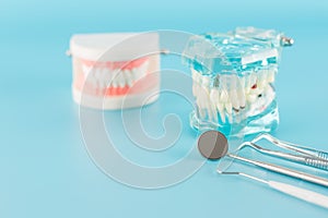 Dental tool and dental disease model in dental concept.