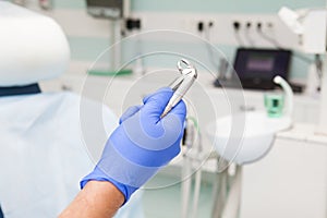 Dental tool for removal of teeth in the hand at the dentist