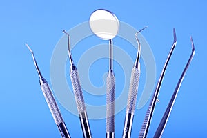 Dental Tools on blue background