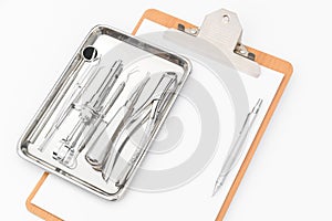 Dental tools, equipment and dental chart on white background