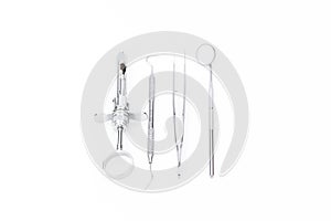 Dental tools and equipment on white background