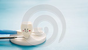 Dental tools and smile teeth model.