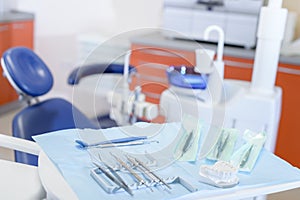 Dental tools on table in stomatology clinic photo