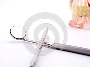 Dental tools on white background