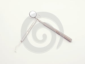 Dental tools on white background
