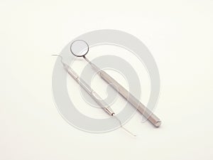 Dental tools on white background