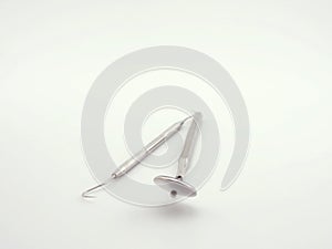 Dental tools on white background