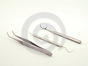 Dental tools on white background