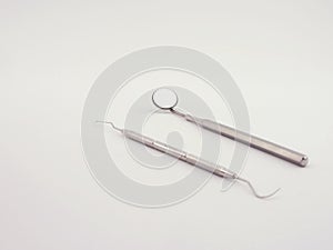 Dental tools on white background