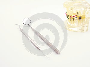 Dental tools on white background