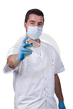 Dentist with anesthetic spray photo