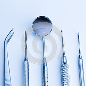 Dentist basic cutlery instruments tools, mirror, tweezers, sonde, tamper caries