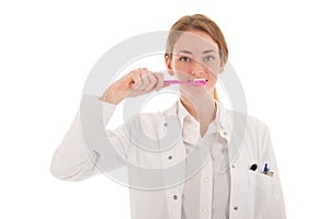 Dentist with brush and tooth paste