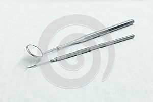 Dentist concept, dental tools on white background