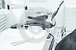 Dentist concept, tools on  dentist chair in dental clinic interior