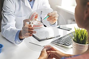 Dentist consultation - patient visit at dental clinics office photo