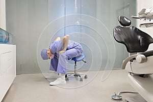 Dentist dealing with pain in lower back - self help