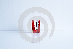 Dentist diagnose plastic teeth models on white blackground,Concept of dental checking