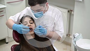 Dentist doctor checking patient teeth