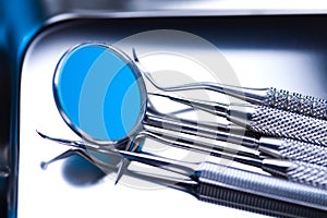 Dentist equipment on blue background