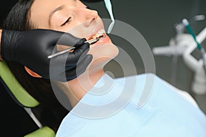 Dentist examining patient& x27;s teeth, close up