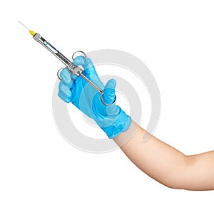 Dentist hand in blue glove holding syringe anesthesia