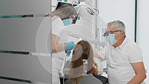 The dentist and his assistant work as one friendly team, providing the patient with an individual approach and a high