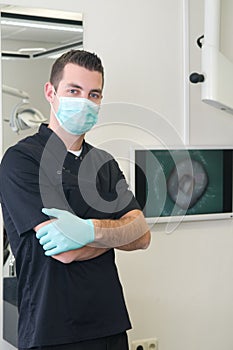 Dentist in his dental practice