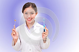 Dentist hold with mirror and toothbrush
