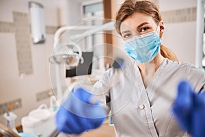 Dentist holding dental tools in a laboratory